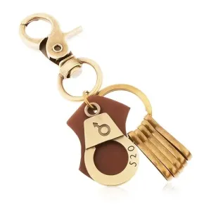 Obesek za ključe v medeninastem odtenku, lisice z vgravirano številko in moškim simbolom