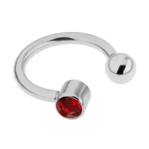 Jeklen piercing za obrv - podkev srebrne barve, rdeč cirkon