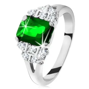 Lesketav prstan srebrne barve, smaragdno zelen cirkon, razdeljena kraka - Velikost: 54