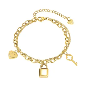 Jeklena zapestnica v zlati barvi - srce s smeškom, ključavnica in ključ, dvojna verižica